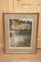 Full view of the framed print showing the entire artwork with marsh scene and gold-tone frame.