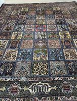Full view of rug showing overall garden tile design