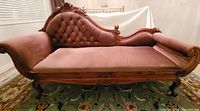 Front view of mauve upholstered chaise lounge sofa