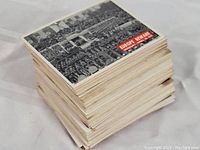 Stack of 88 WWII War Bulletin trading cards from 1965 showing the Europe Denmark front card on top.