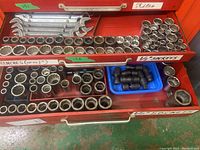 First drawer showing multiple 1/2 inch sockets including impact sockets in blue container