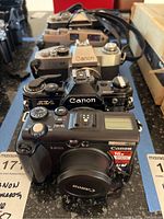 Overview of all four cameras arranged on countertop