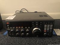 Front view of the entire receiver on carpeted floor