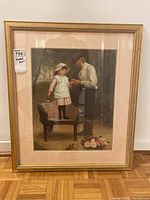 Front view of framed print showing full scene with man and girl on bench, including frame and matting