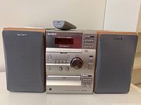 Front view of Sony Micro HiFi stereo system with two speakers showing model and basic design.