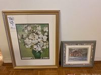 Two framed art prints: larger Van Gogh floral print on left, smaller Trisha Romance house scene on right