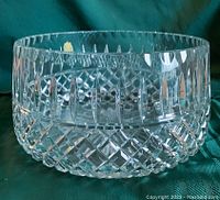 Side angle showing the detailed handcut etched pattern on the lead crystal bowl, highlighting its clarity and weight.