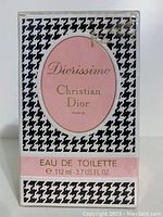 Front of the sealed Diorissimo perfume box showing product name, brand, volume and design.