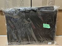 Photo shows all 10 gift bags stacked together sealed in plastic wrapping, highlighting the packaging and quantity.