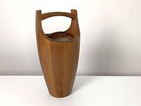 Full view of teak ice bucket with handle and lid attached