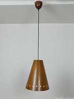 Full view of lamp including shade, cord, and teak ceiling cap