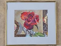 Framed original pastel painting showing a red rose with detailed petals and a soft textured background. Glass has visible damage top left corner.