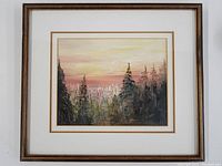 Framed signed original oil painting depicting a forest landscape at sunset with pine trees and a colorful sky.