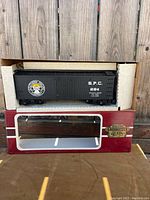 G scale Southern Pacific boxcar in original box showing full length and logo detail