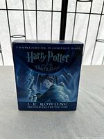 Front view of the blue box set for the Harry Potter and the Order of the Phoenix audiobook on 23 CDs showing cover art and title.