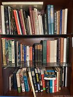 Shelf with three rows of books covering art, artists, sculpture, and related subjects.