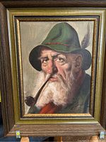 Full view of the framed oil painting depicting the elderly man with green hat and pipe.