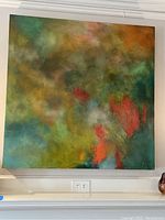 Full front view of the square abstract painting hanging on wall