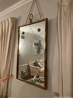 Full view of the hanging mirror on wall