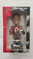 Front view of Mike Alstott bobblehead in box showing figure and packaging details