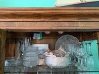 Full display of mixed glassware on shelf