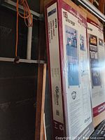 Photo of the boxed E-Z Storage utility cabinet model 40740 showing front view with product image and specifications.