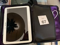 Samsung tablet inside purple protective case, front view of tablet screen