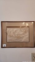 Framed relief artwork showing antlers, overall view