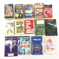 Top-down view of all 14 books in the lot arranged in rows showing titles and cover art for identification.