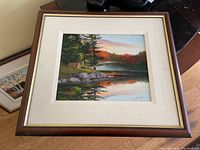 Photo of entire framed painting showing the artwork and frame in clear detail.