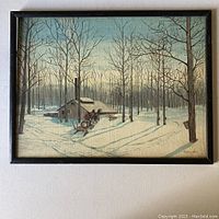 Full view of folk art painting showing sugar shack, forest with bare trees, horse-drawn sled, and man in red checked jacket. Narrow black frame visible.