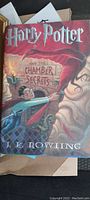 Front cover of the hardcover book with colorful illustration and title 'Harry Potter and the Chamber of Secrets'.