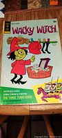 Front cover of Wacky Witch vintage comic book showing colorful cartoon illustration of a witch character and story teaser about the Three Tusketeers.