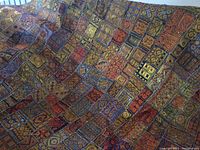 Full view of colorful Indian handmade wall hanging with patchwork embroidery.