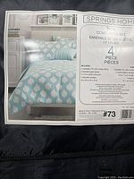 Packaging label showing Springs Home Twin Comforter Set, 4 pieces per set with design and dimensions