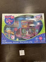 Photo of the Littlest Pet Shop boxed set including Blythe doll, jet vehicle playset, and pet figures