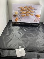 Box of 3-tier cooling rack with image of cookies on rack