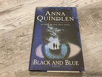 Front cover of 'Black and Blue' by Anna Quindlen showcasing the book's dust jacket design
