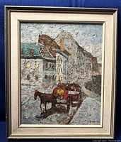 Full view of the framed impasto oil painting depicting a European cityscape with a horse and cart on a street.