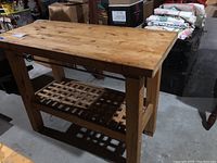 Full front left angle view showing butcher block top and lattice shelf
