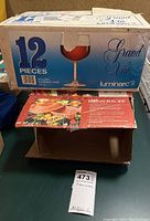 Box of 12 Luminarc Grand Vin oversized red wine glasses, 13 pieces, 13oz capacity with part of Romertopf claypot box beneath