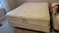 Full view of mattress and box spring stacked