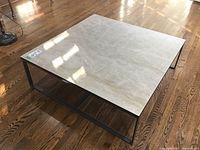 Top-down perspective showing full laminate surface and metal base