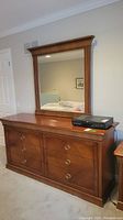 Front view of dresser and mirror showing overall appearance