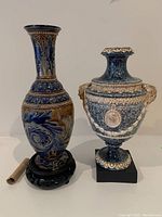 Both ceramic pieces side by side on white surface