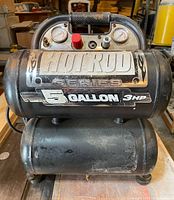Front view of the compressor showing the Hot Rod branding and tank size/power specs.