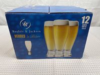 Front view of blue box containing 12 Mayfair & Jackson beer glasses, showing glass images and capacity details