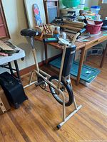 Full view of the CCM stationary exercise bike showing frame, seat, and timer unit.