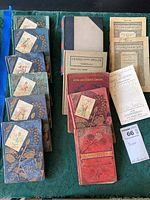 Full display of the antique book collection including Ruthie's Text story books, the graded speller, literature series booklets, and Declaration of Independence booklet