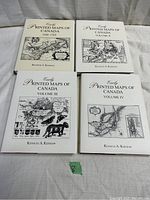 Four books laid flat showing covers with black and white historical maps and titles by Kenneth A. Kershaw.